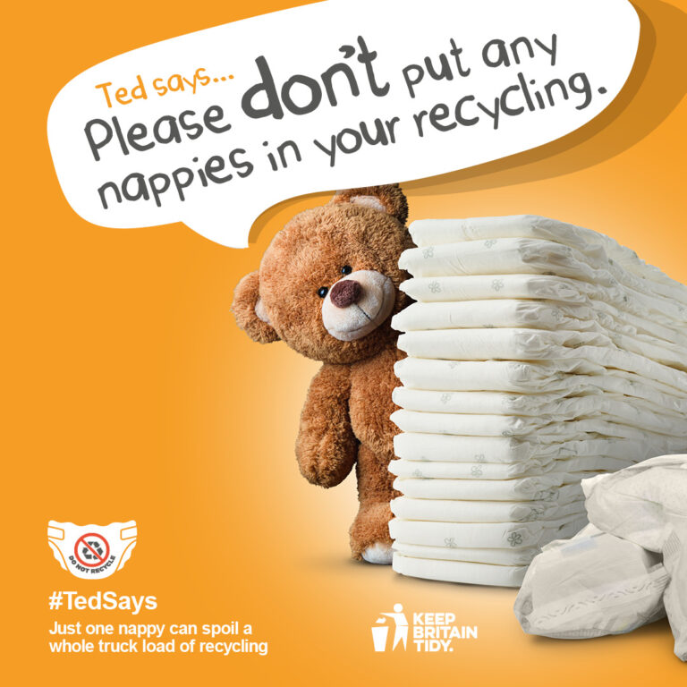 Teddy bear stood behind pile of nappies with speech bubble. Text reads 