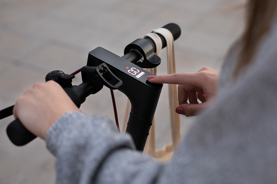 Person using an electric scooter