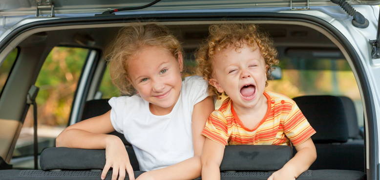 Two kids in a car