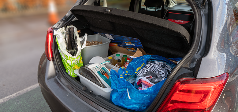 a car boot full of recycling