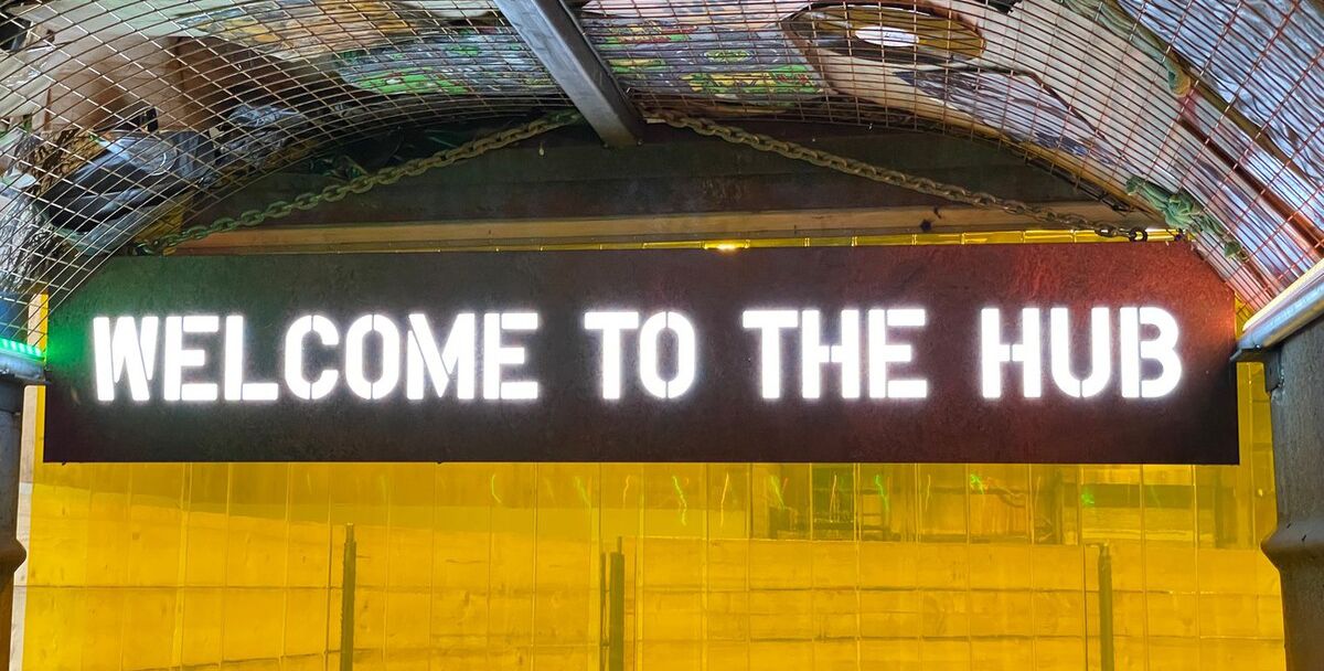 entrance to the Renew Hub. Sign reads"Welcome to the hub"